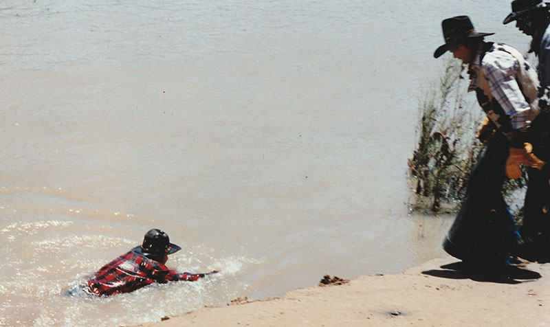 Lee Diebold (in the water) in Moab, Utah. The sequence is 'The Shakey Pete Gang' shot by KY Michaelson, Stunt Masters