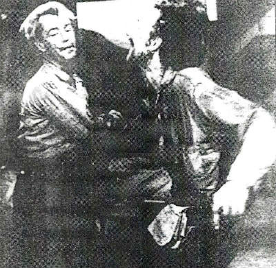 Bad-guy Lucky takes a good one from Alan Ladd in 'Shane' (1953)